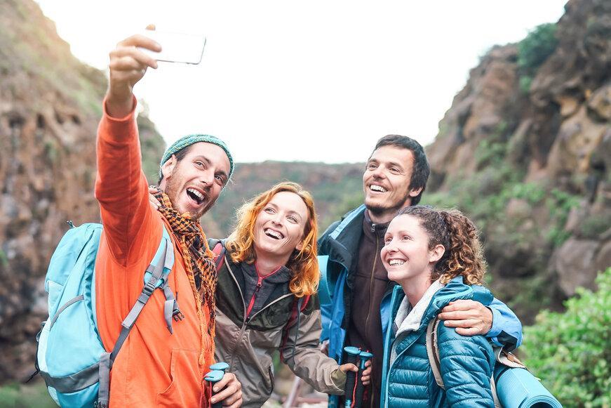 Friends taking a selfie in the Colorado mountains | dentist Arvada, CO