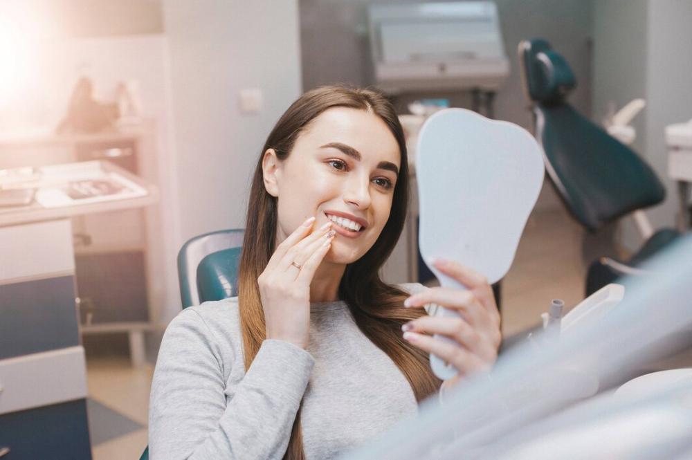 woman smiling in dental chair