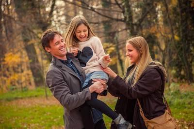 general family dentist arvada, co | Family playing in park