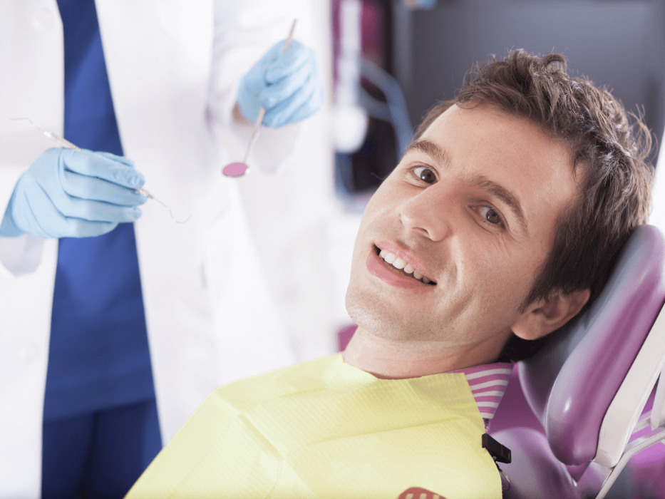 root canals arvada | man at dentist