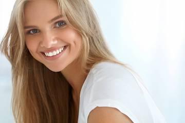 porcelain veneers in arvada, co | woman with bright smile
