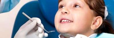 A child getting a dental exam at the Arvada dentist