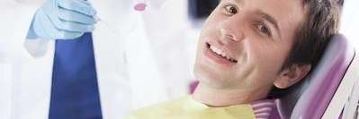 Arvada dentist | man receiving a dental exam