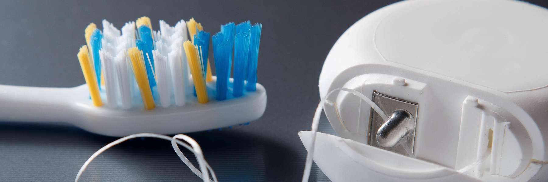 Toothbrush and floss | Arvada dentist
