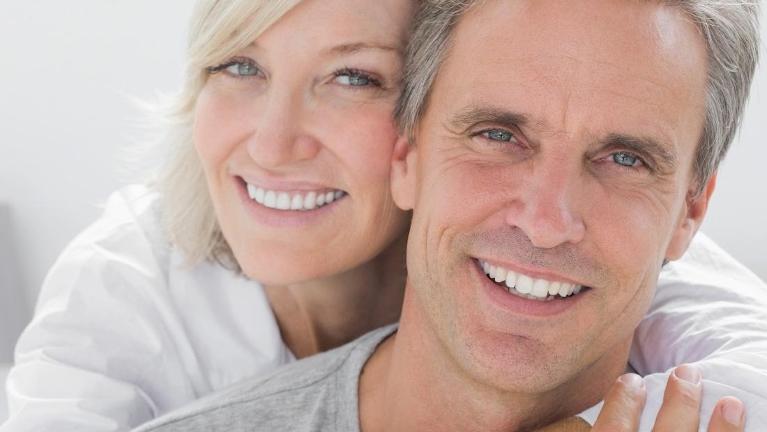 dental implants in arvada | couple smiling